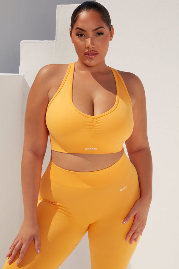 Cross Back Strap Sports Bra in Light Orange
