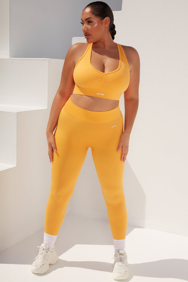 Cross Back Strap Sports Bra in Light Orange